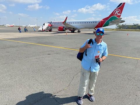 Jason Sucher in front of the plane