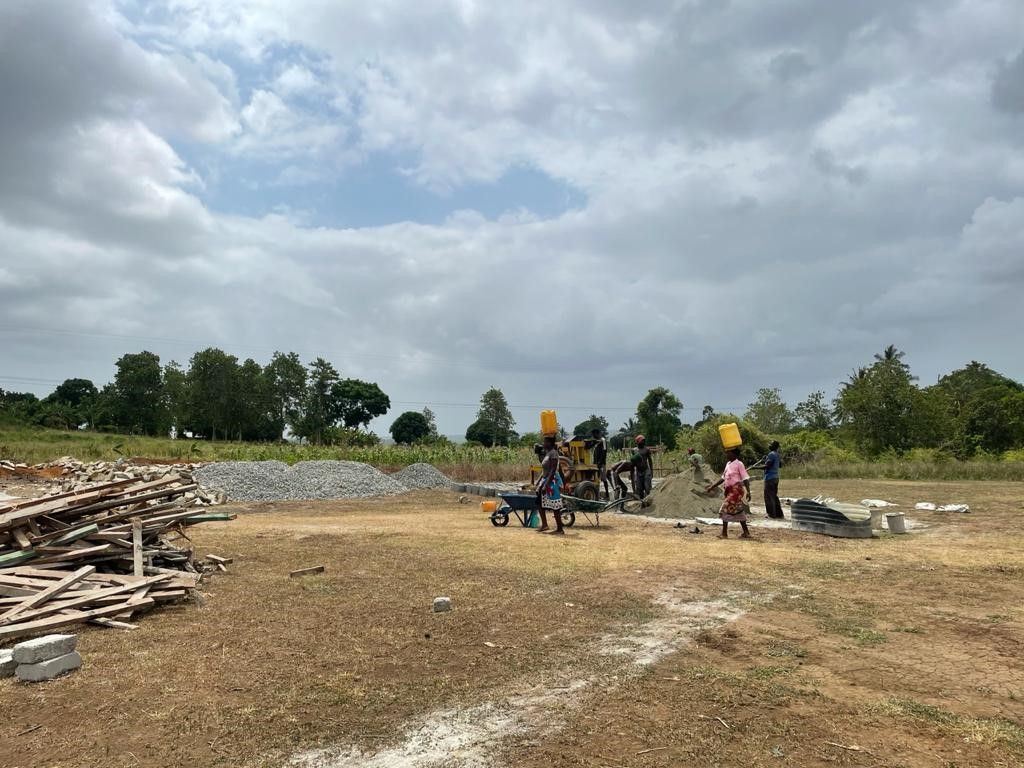 Workers working on the new school